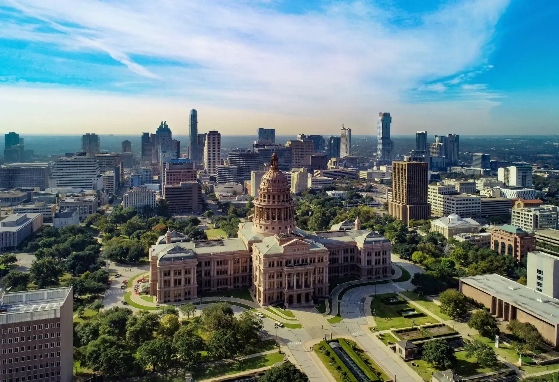 Aerial view of city skyline and capitol.